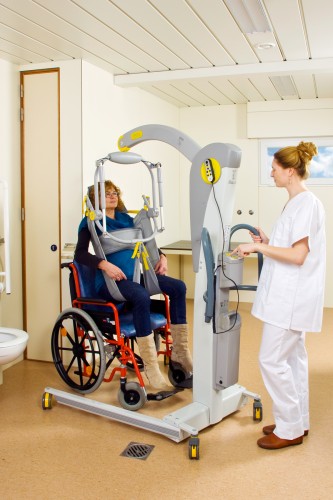 Mobiele tillift '2600' (Victor) ; Mobiele tillift met elektrisch kanteljuk 2610 (Victor) ; Toilettildoek met hoofdsteun ; Elektrisch kanteljuk - Handi-Move Tilliften